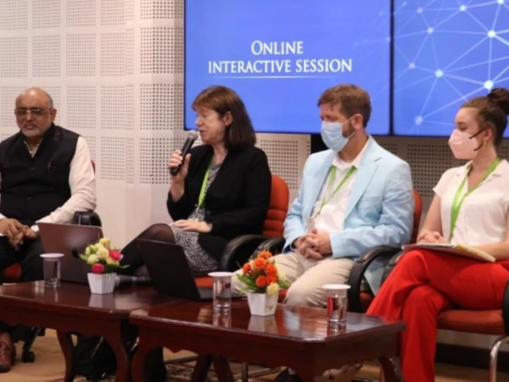 UAHS and Amrita team members participating in a panel discussion.
