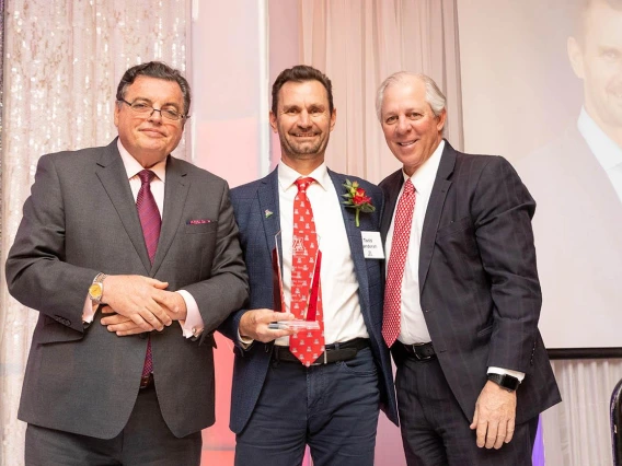 Todd Vanderah poses with President Robbins and COM-T Dean Abecassis.