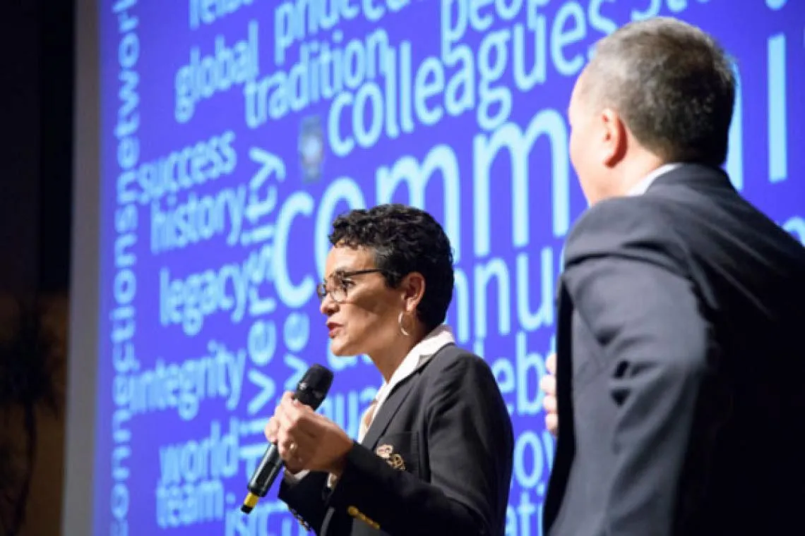 Strategic plan co-chair Lisa Ordóñez introduces the day's activities as fellow co-chair Elliott Cheu listens.